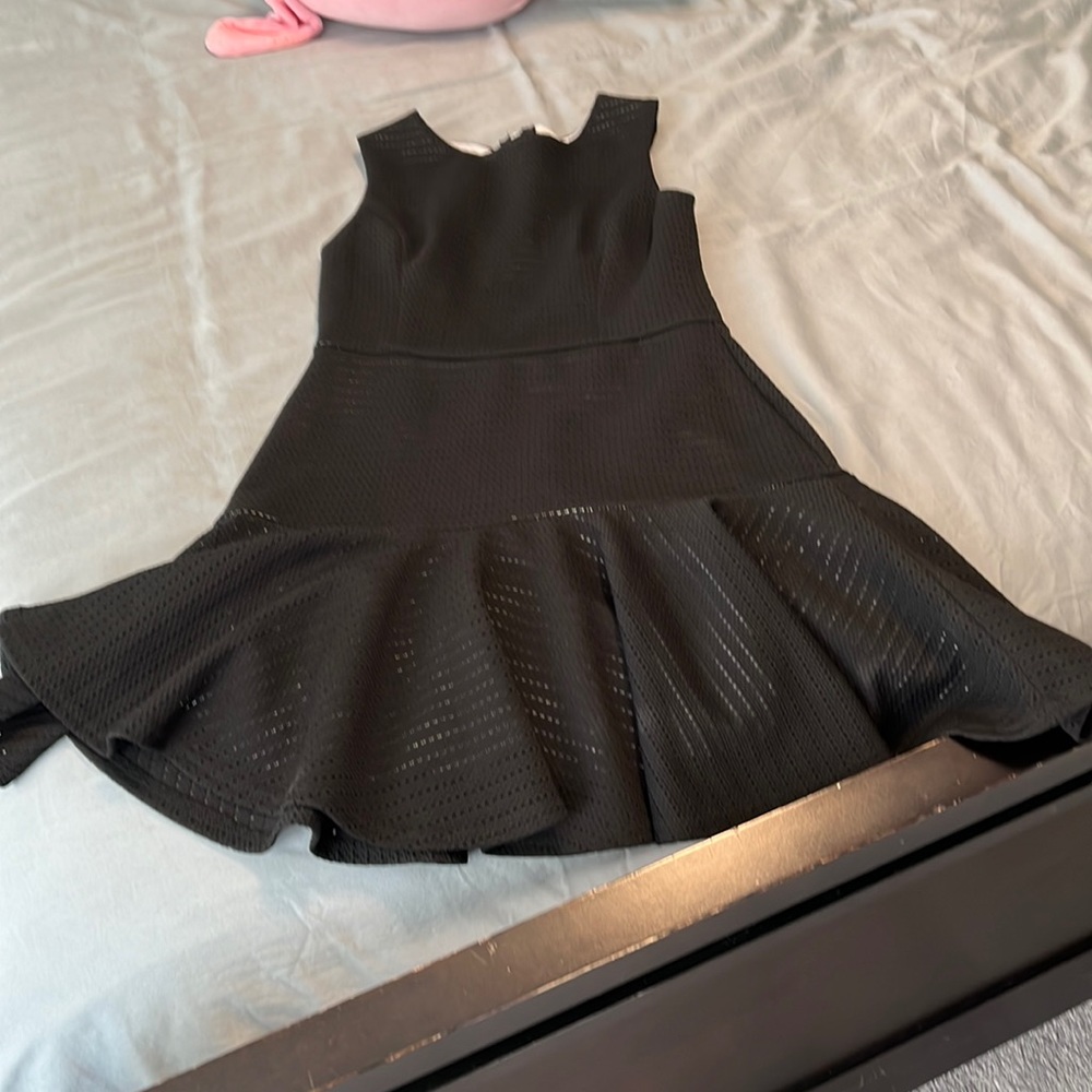 Aqua dress size medium. Worn only once. Black with with underneath.